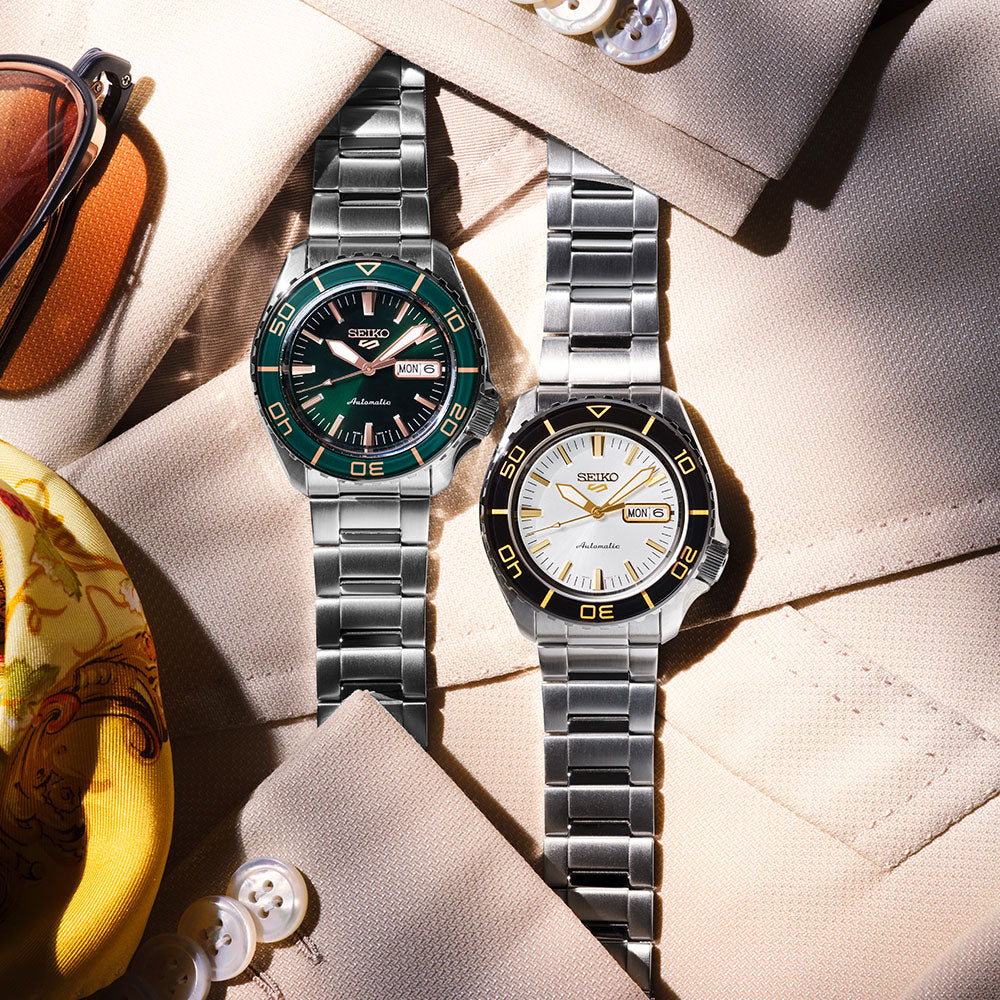 Seiko 5 Sports HDB004 front view with white sunburst dial, black bezel and gold-coloured hands