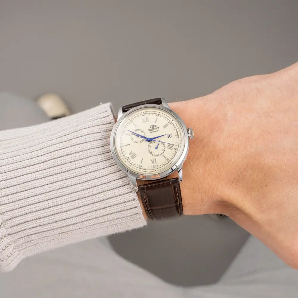 Orient Bambino RA-AK0702Y Automatic Multi-Dial Ivory Roman Dial Leather Strap Men’s Watch