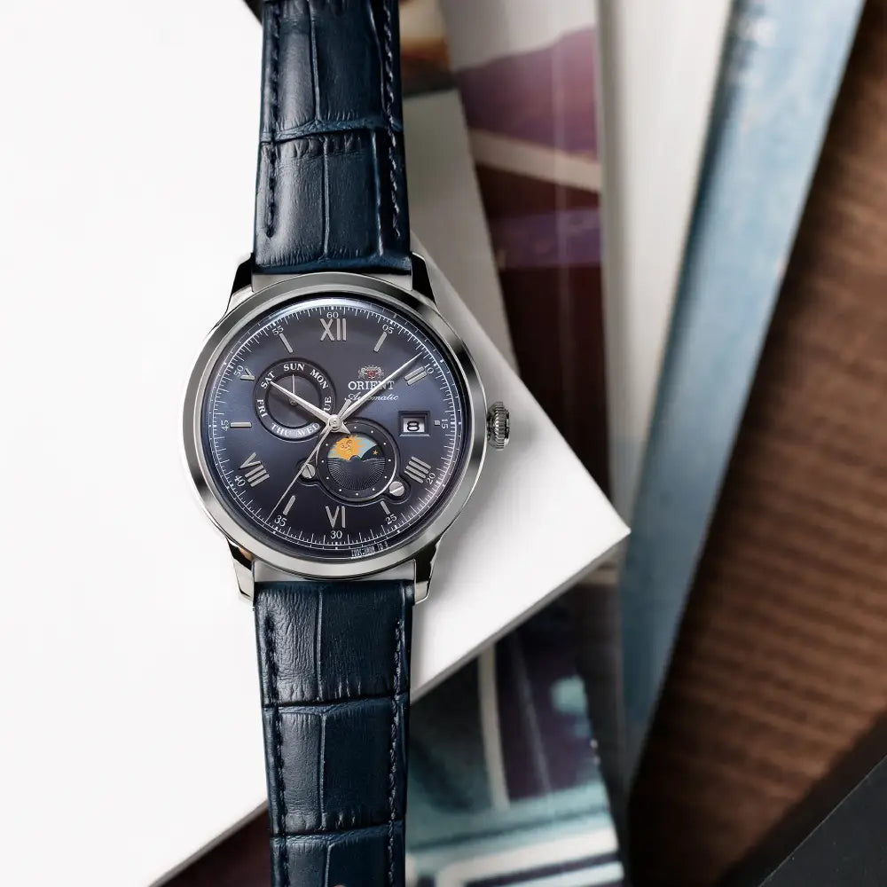 Orient Bambino Sun & Moon RA-AK0806L Automatic Navy Blue Dial Leather Strap Men’s Watch