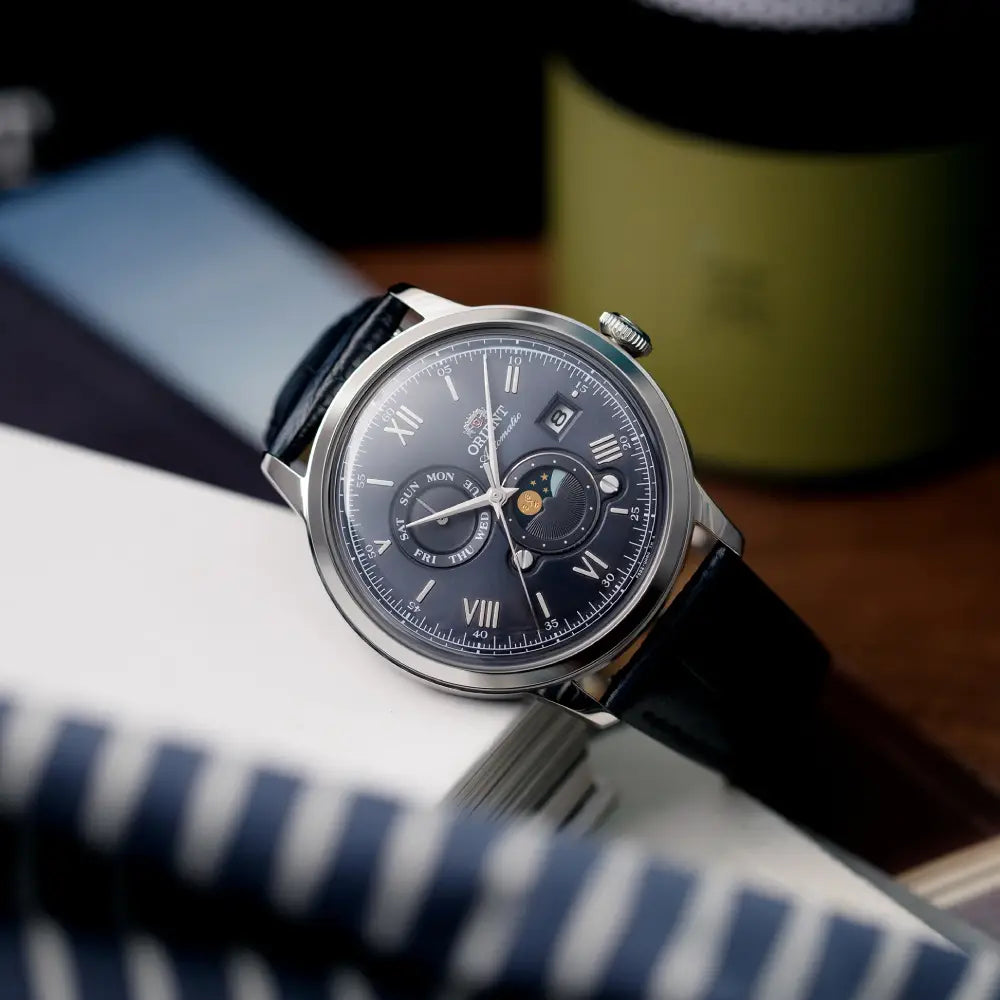 Orient Bambino Sun & Moon RA-AK0806L Automatic Navy Blue Dial Leather Strap Men’s Watch