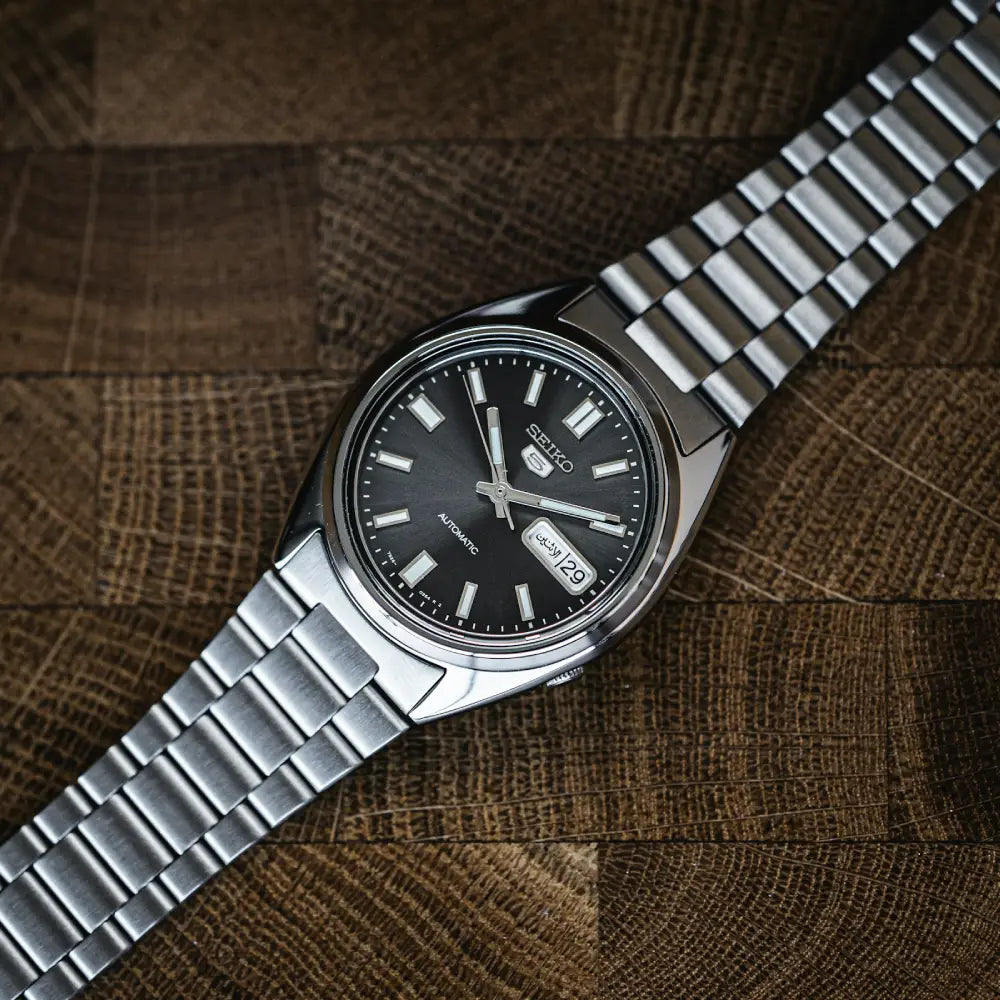Seiko 5 SNXS79K1 day-date window and dial close-up