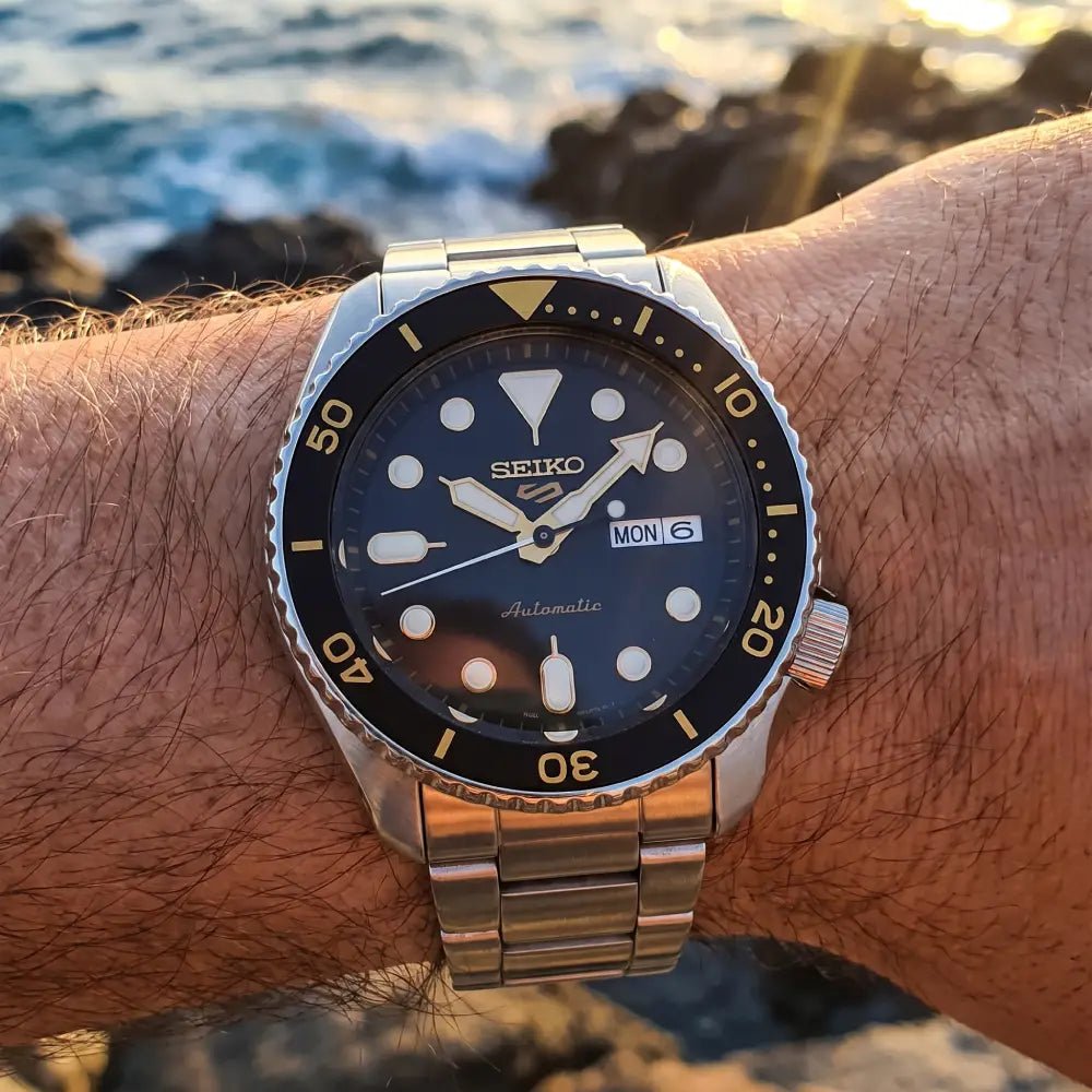 Seiko-Seiko 5 Sports SKX Series SRPD57K1 Automatic Black Dial Gold-Tone Accents Stainless Steel Men's Watch-Wristbear-2