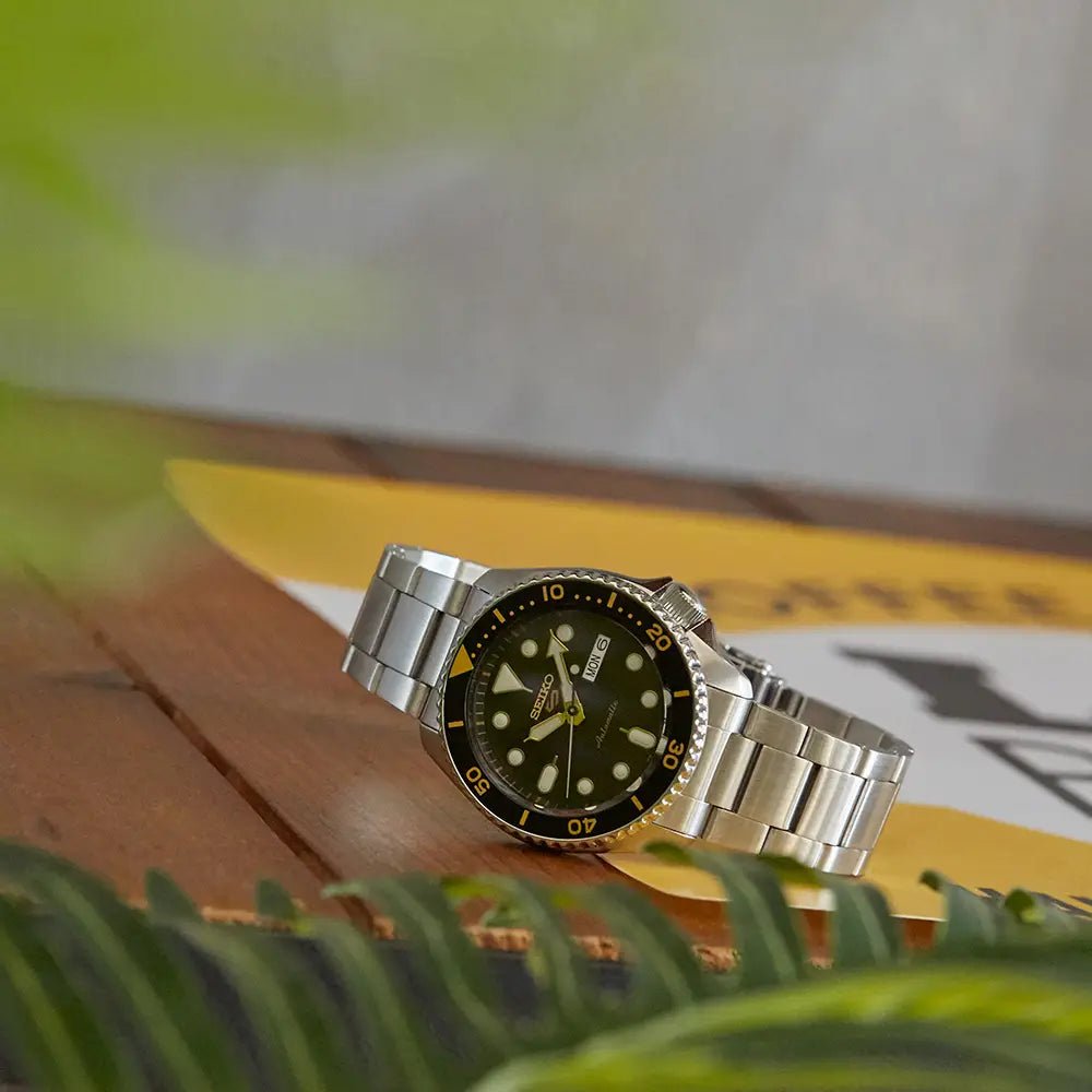 Seiko-Seiko 5 Sports SKX Series SRPD57K1 Automatic Black Dial Gold-Tone Accents Stainless Steel Men's Watch-Wristbear-2