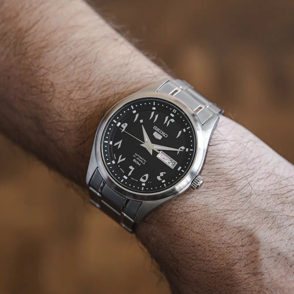 Seiko 5 SNKP21J1 Automatic Black Arabic Dial Stainless Steel Men’s Watch - shop_name SeikoSNKP21J1